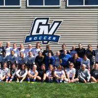 Group photo of alumni soccer players